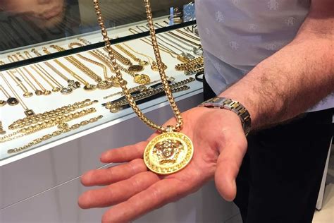 versace necklace stolen|Australian Man Uses Fishing Rod To Steal Versace Necklace.